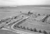 Aerial photograph of a farm in Saskatchewan (32-37-24-W3)