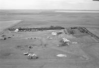 Aerial photograph of a farm in Saskatchewan (20-37-24-W3)