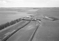 Aerial photograph of a farm in Saskatchewan (21-37-24-W3)