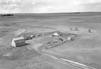 Aerial photograph of a farm in Saskatchewan (28-37-25-W3)