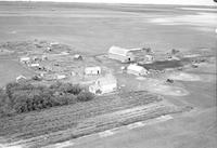 Aerial photograph of a farm in Saskatchewan (22-37-25-W3)