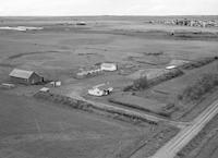 Aerial photograph of a farm in Saskatchewan (9-37-25-W3)