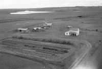Aerial photograph of a farm in Saskatchewan (17-37-25-W3)