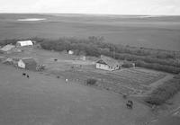Aerial photograph of a farm in Saskatchewan (18-37-25-W3)