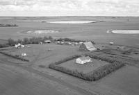 Aerial photograph of a farm in Saskatchewan (38-27-W3)