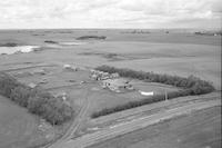 Aerial photograph of a farm in Saskatchewan (32-38-27-W3)