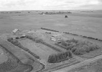 Aerial photograph of a farm in Saskatchewan (32-38-27-W3)