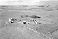 Aerial photograph of a farm in Saskatchewan (34-38-27-W3)