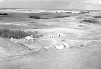 Aerial photograph of a farm in Saskatchewan (36-38-27-W3)