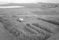 Aerial photograph of a farm in Saskatchewan (23-38-27-W3)