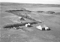 Aerial photograph of a farm in Saskatchewan (38-28-W3)