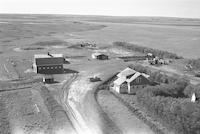 Aerial photograph of a farm in Saskatchewan (38-28-W3)