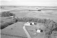 Aerial photograph of a farm in Saskatchewan (38-28-W3)