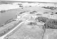 Aerial photograph of a farm near Cando, SK (39-15-W3)