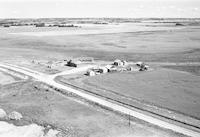 Aerial photograph of a farm in Saskatchewan (39-15-W3)