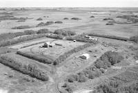 Aerial photograph of a farm in Saskatchewan (39-27-W3)