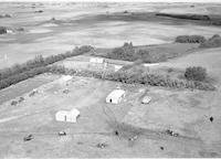 Aerial photograph of a farm in Saskatchewan (39-27-W3)