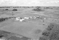 Aerial photograph of a farm in Saskatchewan (39-27-W3)