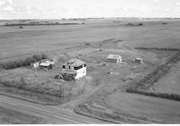 Aerial photograph of a farm in Saskatchewan (39-27-W3)