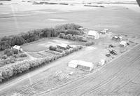 Aerial photograph of a farm near Blaine Lake, SK (44-6-W3)