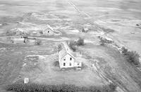 Aerial photograph of a farm in Saskatchewan (24-36-22-W3)