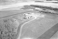 Aerial photograph of a farm in Saskatchewan (40-11-W3)