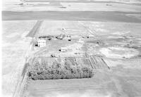 Aerial photograph of a farm in Saskatchewan (35-41-8-W3)