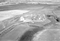 Aerial photograph of a farm in Saskatchewan (41-10-W3)