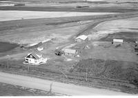 Aerial photograph of a farm in Saskatchewan (41-11-W3)