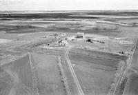 Aerial photograph of a farm in Saskatchewan (8-42-12-W3)
