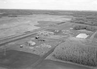 Aerial photograph of a farm in Saskatchewan (41-8-W3)