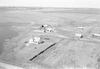 Aerial photograph of a farm in Saskatchewan (39-15-W3)