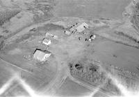 Aerial photograph of a farm in Saskatchewan (39-15-W3)