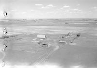 Aerial photograph of a farm in Saskatchewan (24-39-15-W3)