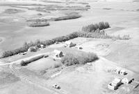 Aerial photograph of a farm in Saskatchewan (28-39-15-W3)