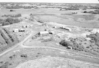Aerial photograph of a farm in Saskatchewan (21-39-15-W3)