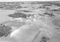 Aerial photograph of a farm in Saskatchewan (39-15-W3)