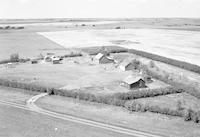 Aerial photograph of a farm in Saskatchewan (39-15-W3)