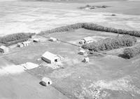 Aerial photograph of a farm in Saskatchewan (39-15-W3)