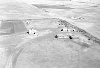 Aerial photograph of a farm in Saskatchewan (39-15-W3)