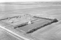 Aerial photograph of a farm in Saskatchewan (39-16-W3)