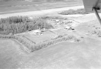 Aerial photograph of a farm in Saskatchewan (12-41-9-W3)