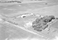 Aerial photograph of a farm in Saskatchewan (42-9-W3)