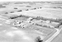 Aerial photograph of a farm in Saskatchewan (42-9-W3)