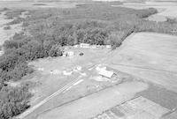 Aerial photograph of a farm in Saskatchewan (26-42-9-W3)
