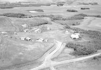 Aerial photograph of a farm in Saskatchewan (24-42-9-W3)