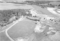 Aerial photograph of a farm in Saskatchewan (42-9-W3)