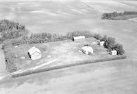 Aerial photograph of a farm in Saskatchewan (42-11-W3)