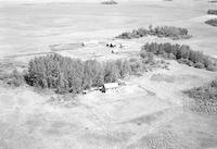 Aerial photograph of a farm in Saskatchewan (34-42-23-W3)