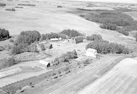 Aerial photograph of a farm in Saskatchewan (36-42-23-W3)